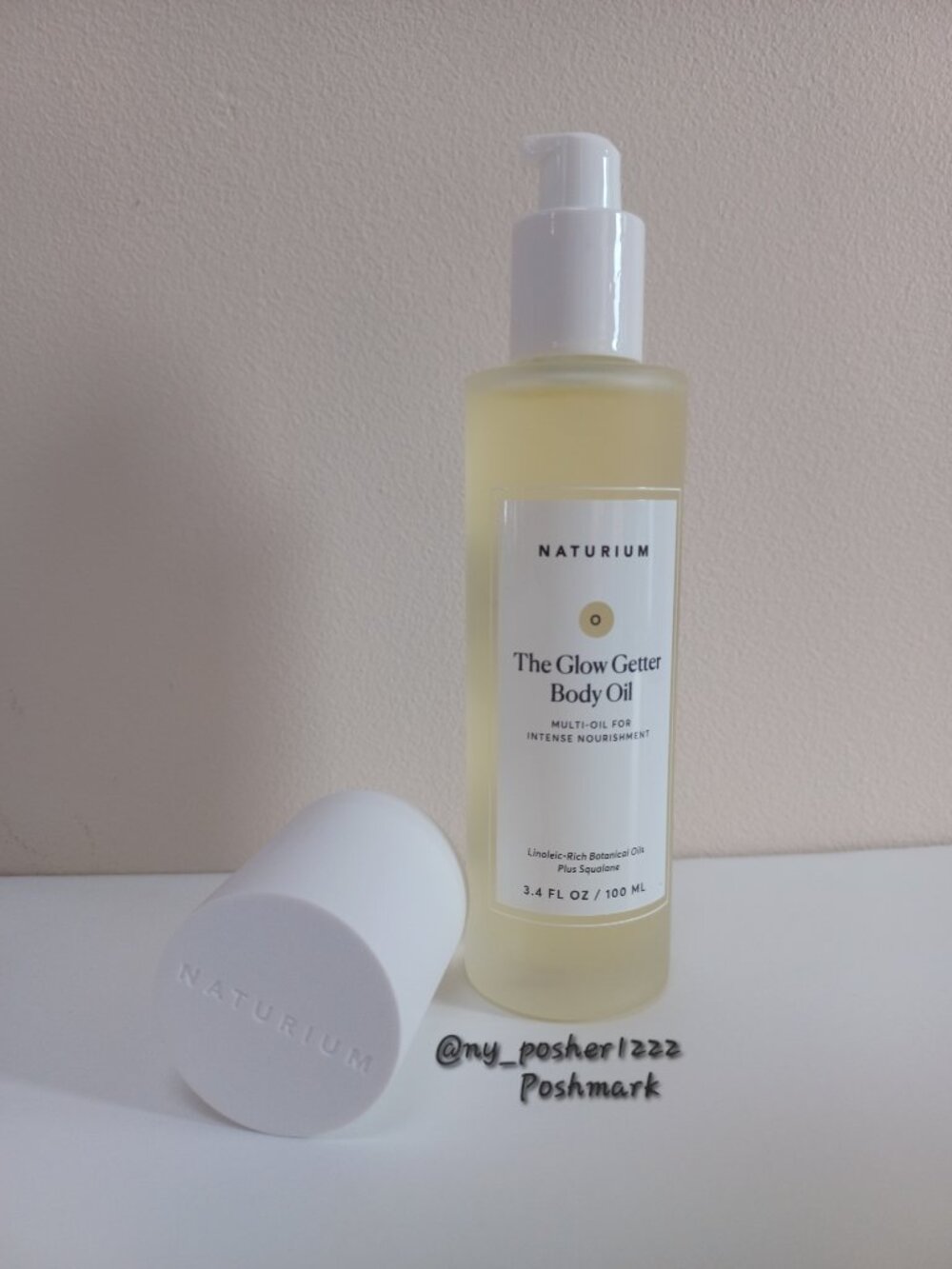 𝗡𝗔𝗧𝗨𝗥𝗜𝗨𝗠 𝐓𝐡𝐞 𝐆𝐥𝐨𝐰 𝐆𝐞𝐭𝐭𝐞𝐫 𝐁𝐨𝐝𝐲 𝐎𝐢𝐥 3.4 fl oz/100 ml🟡 - Picture 8 of 16